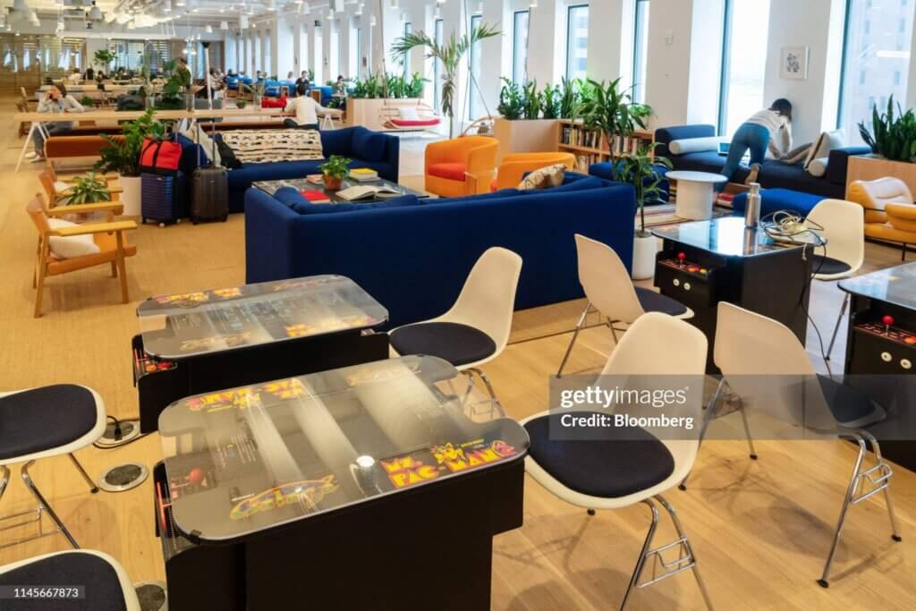 Inside A WeWork Space Ahead Of Planned IPOMs. Pac-Man video game machines sit at the WeWork Cos Inc. 85 Broad Street offices in the Manhattan borough of New York, U.S., on Wednesday, May 22, 2019. WeWork has become the biggest private office tenant in London, Manhattan and Washington on its way to 425 office locations in 36 countries overall. Photographer: David 'Dee' Delgado/Bloomberg via Getty Images