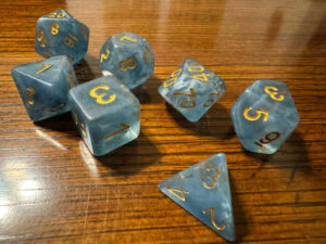 The Neopets RPG will require a set of dice like these