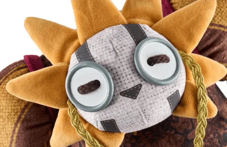 Clair Obscure: Expedition 33 Esquie, dark fantasy, RPG, Esquie Plush, IGN store, close up on facial details