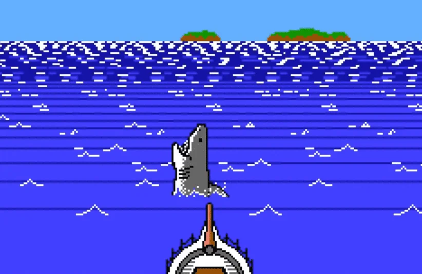 Jaws Retro Edition celebrating 50th anniversary of film, Limited Run Games rehashing NES, 8-bit pixelated game with Jaws references, featuring Enhanced version, standard edition and bigger boat edition, Bruce the Great White Shark